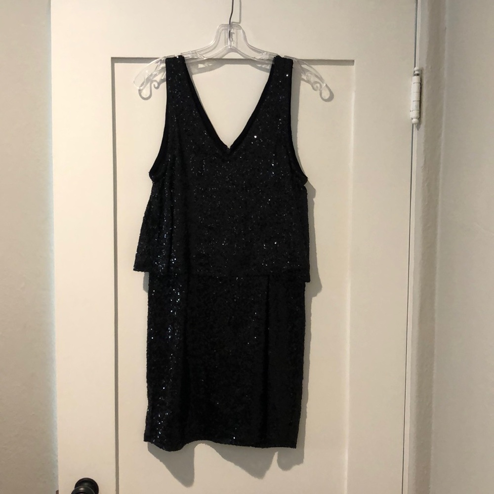 Black sequin party dress.
